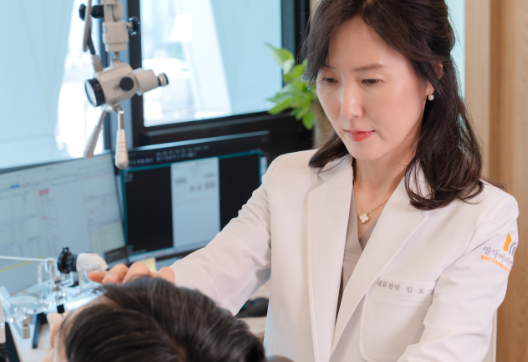 Dr. Bo-Young Kim examining a patient